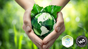 Planet in woman's hands collage, showing care for environment
