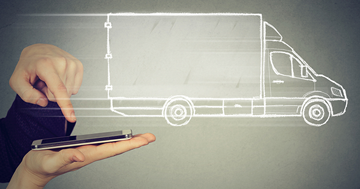 The image of truck and ipad, reprezenting freight digitization