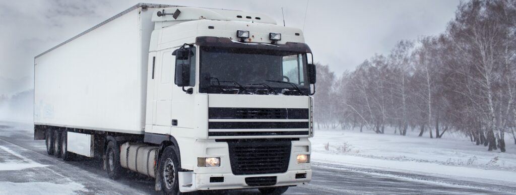 Freight truck on snowy road