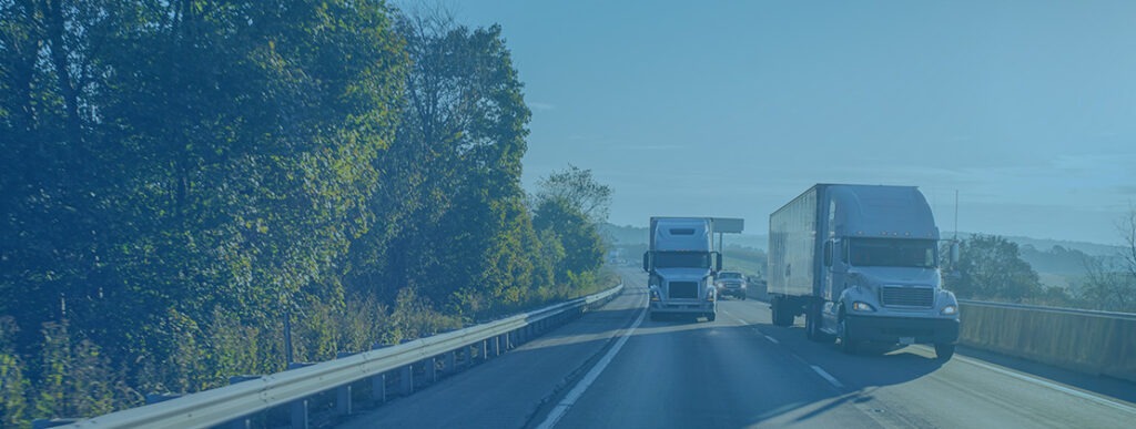 Trucks hauling freight by road