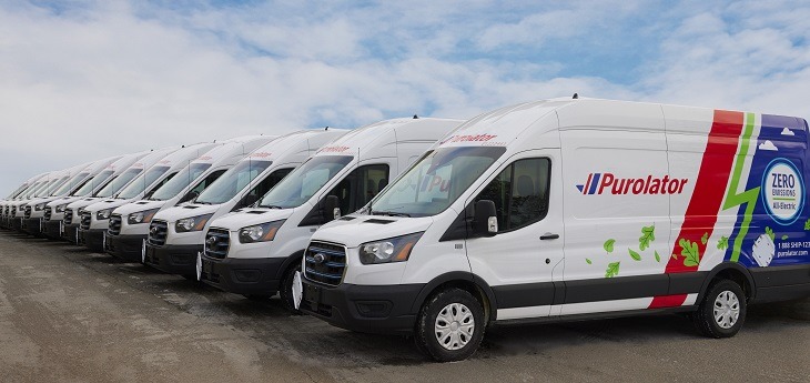 Purolator's green van fleet parked in a row