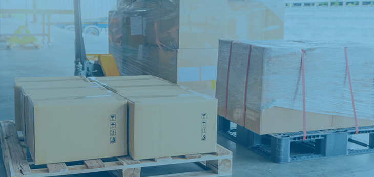 Boxes, neatly stacked on a pallet in a warehouse